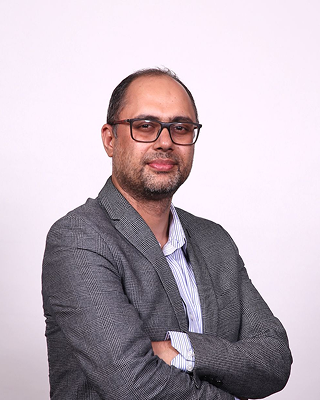 Dr. Kamal KC